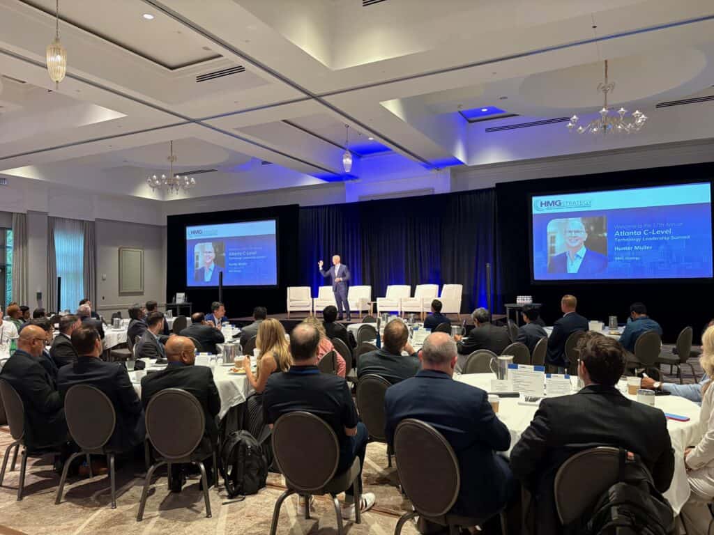 Hunter Muller Founder and CEO of HMG Strategy on stage at the Atlanta C-Level Technology Leadership Summit